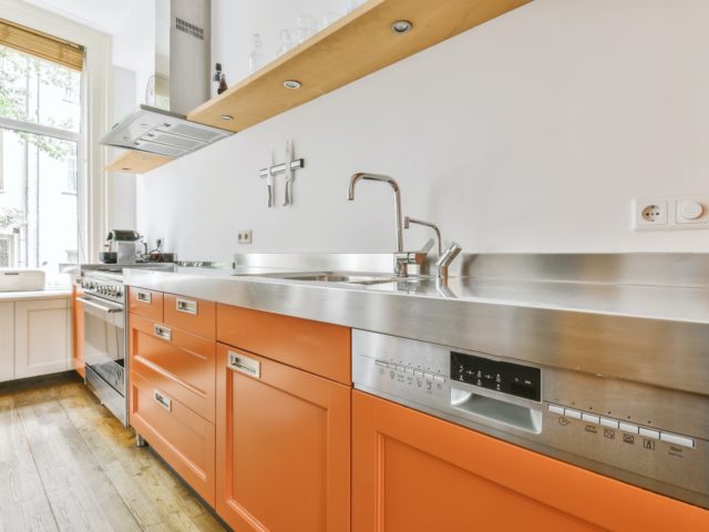 Amazing kitchen with orange kitchen set